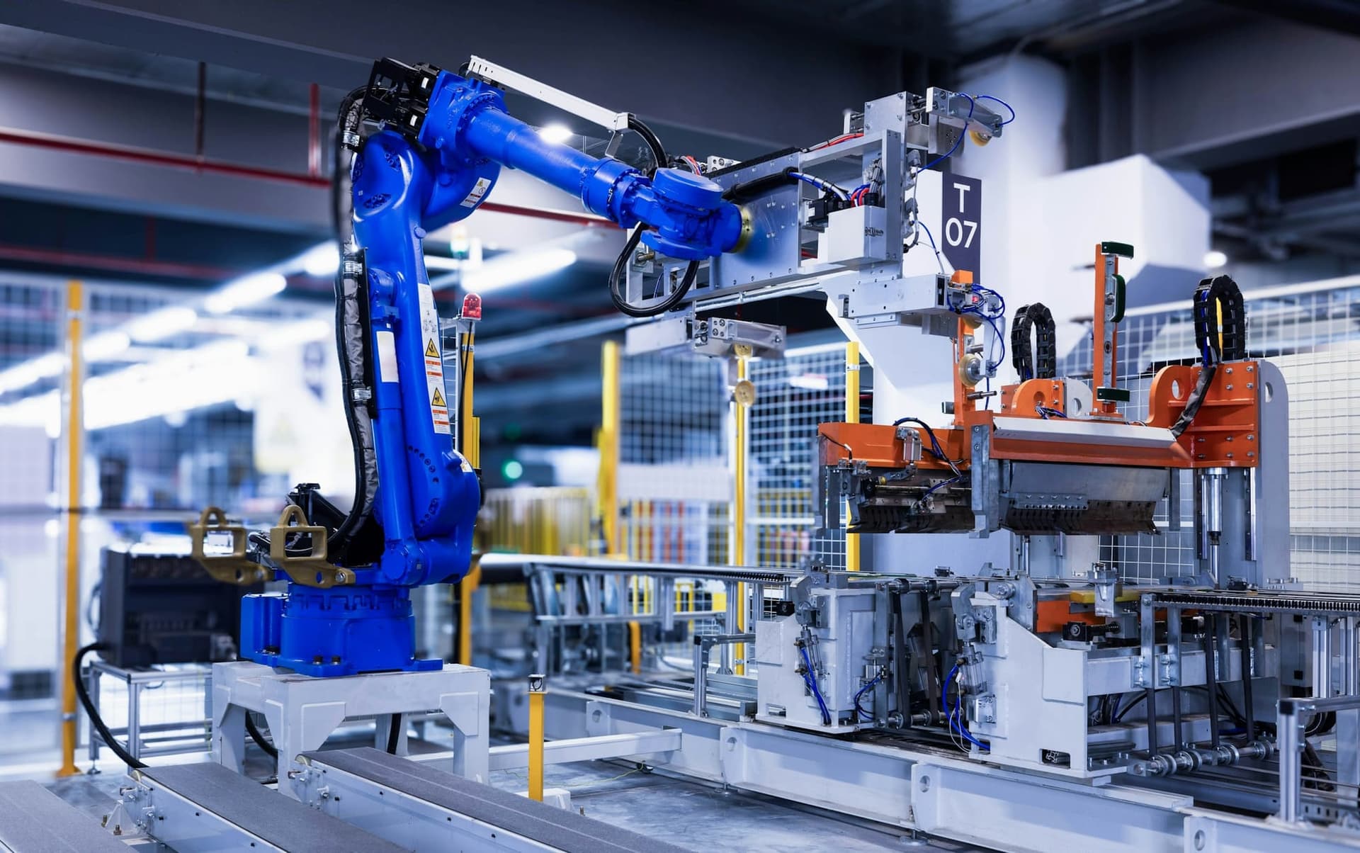 Industrial robot arm on a factory production line